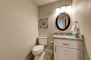 waterfront lake house with hot tub and firepit