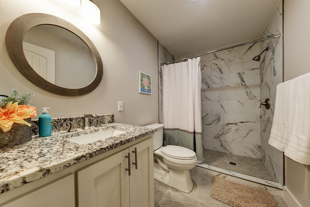 waterfront lake house with hot tub and firepit