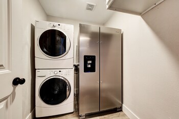 waterfront lake house with hot tub and firepit