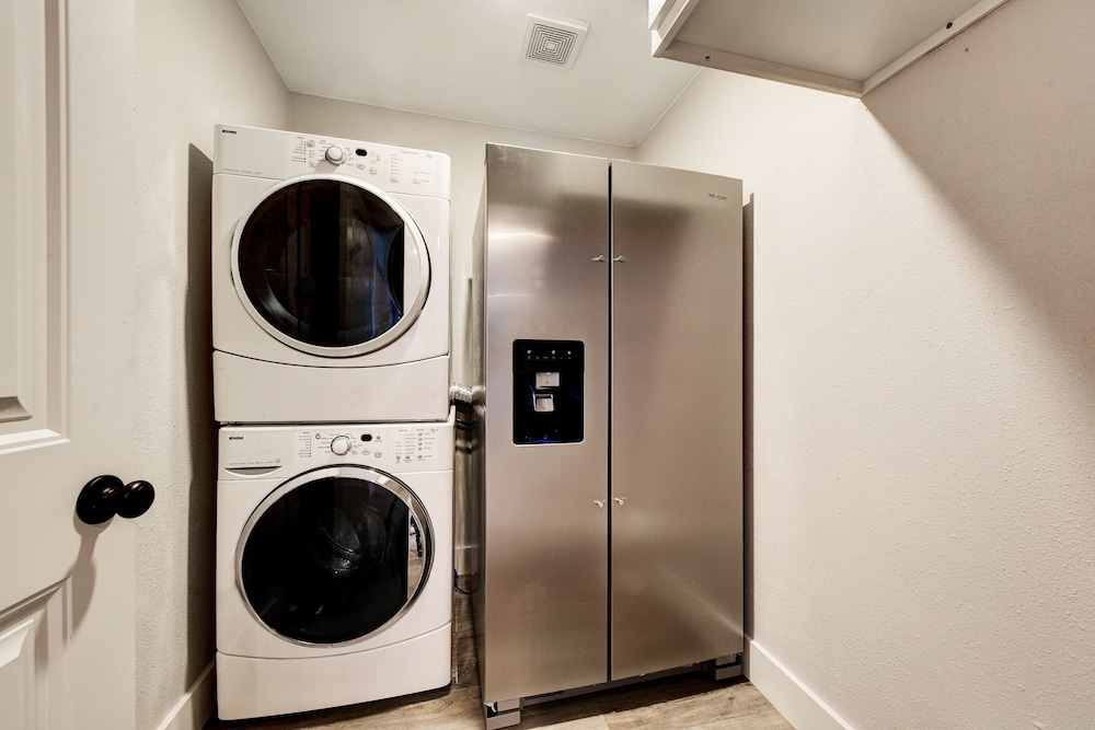 waterfront lake house with hot tub and firepit