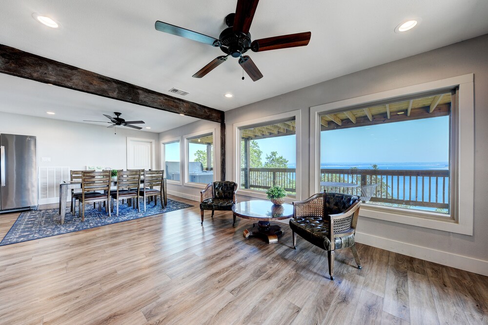 waterfront lake house with hot tub and firepit
