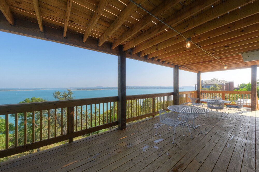 waterfront lake house with hot tub and firepit