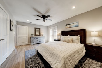 waterfront lake house with hot tub and firepit