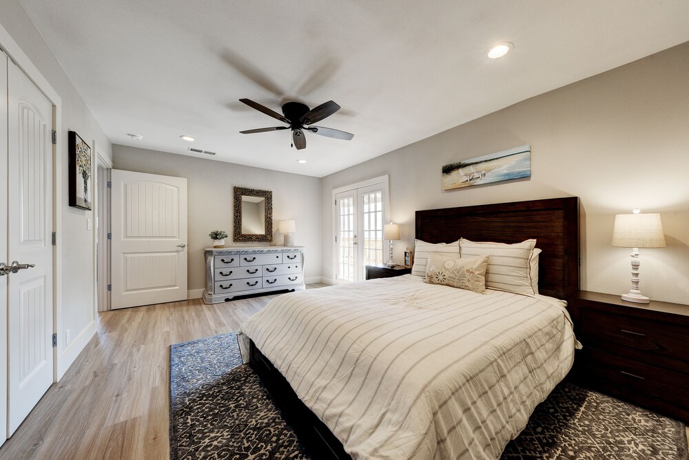 waterfront lake house with hot tub and firepit