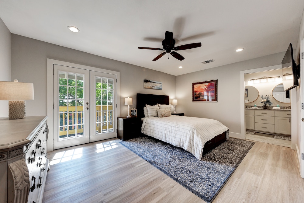 waterfront lake house with hot tub and firepit