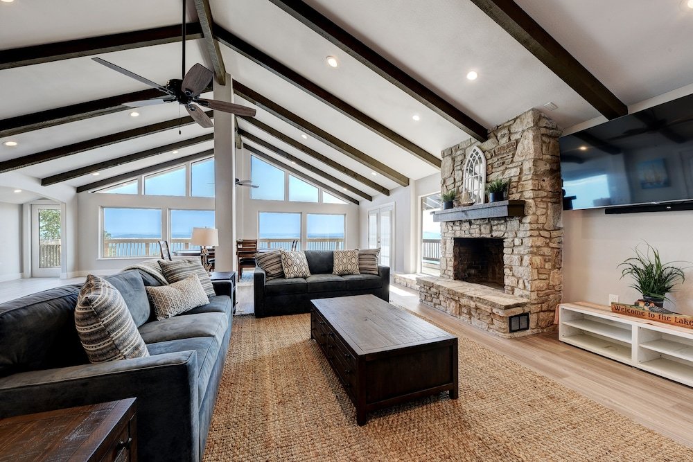 waterfront lake house with hot tub and firepit