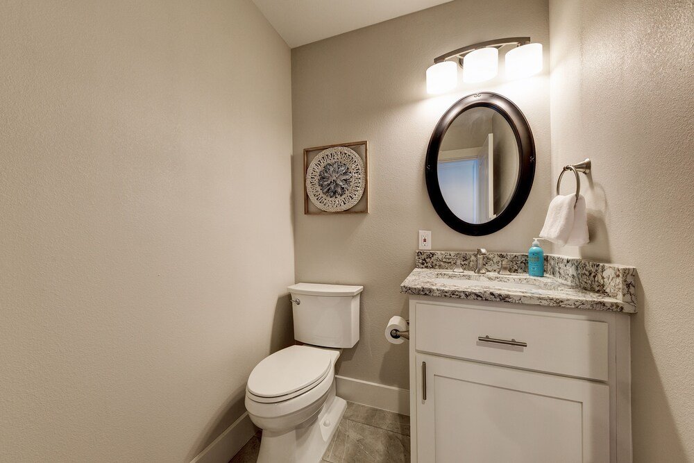 waterfront lake house with hot tub and firepit