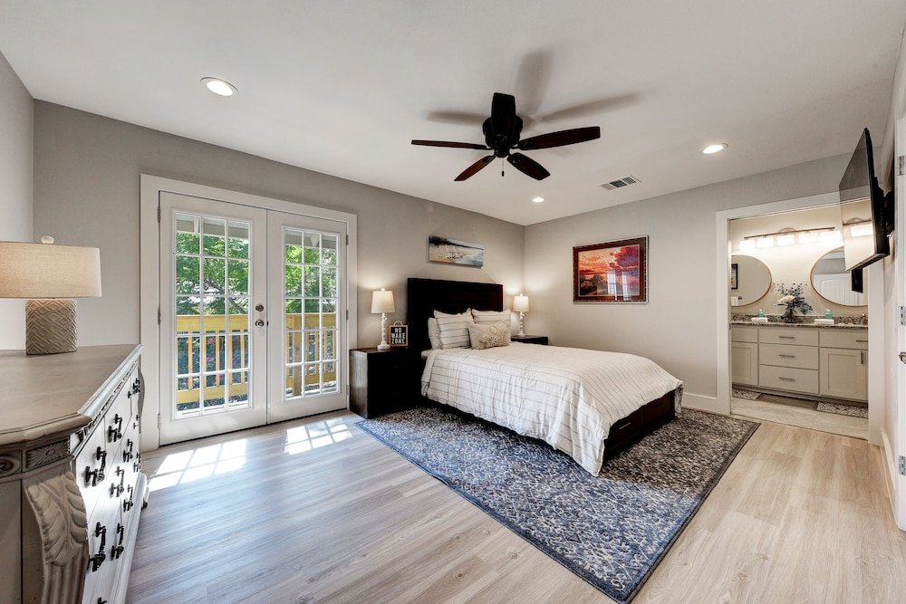 waterfront lake house with hot tub and firepit