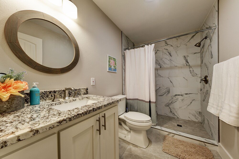 waterfront lake house with hot tub and firepit