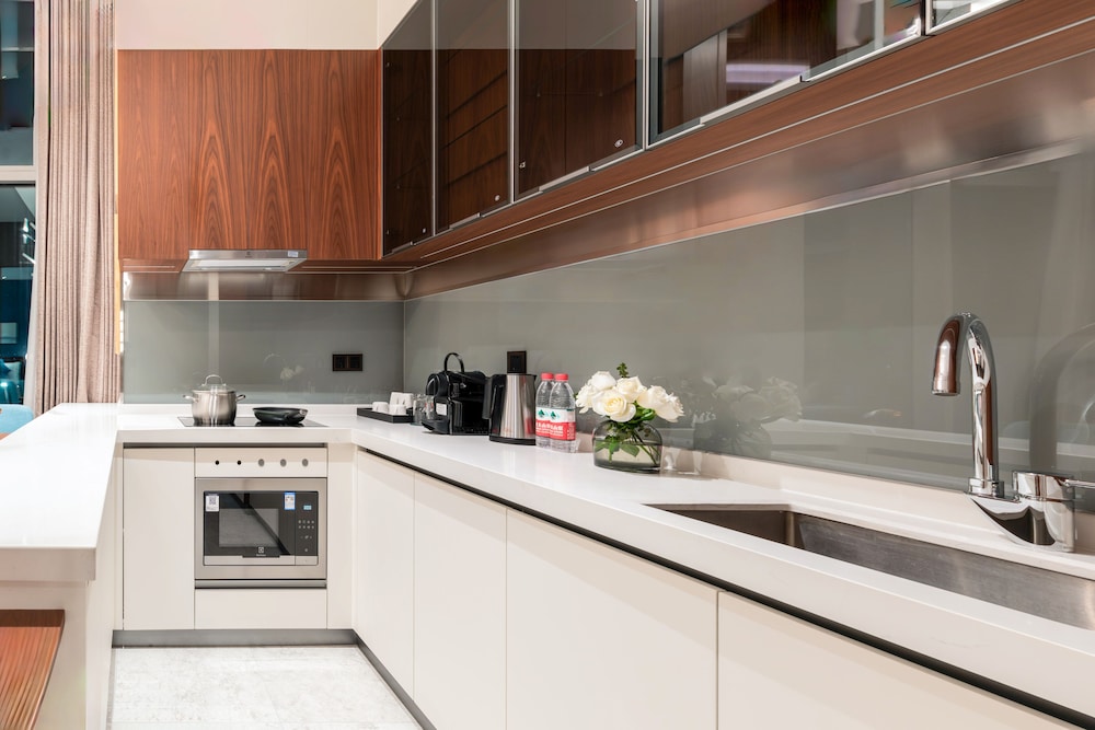 shan zhi ye serviced apartment hotel houjie wanda plaza liaoxia subway station