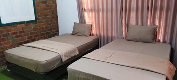 oyo 92767 losmen griya mulia katingan