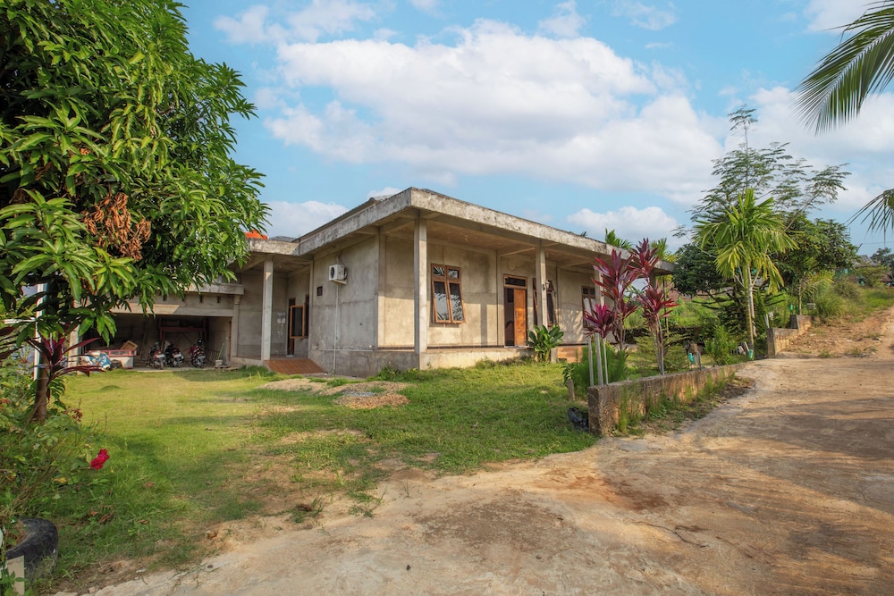 oyo 92587 homestay romauli kampung radja