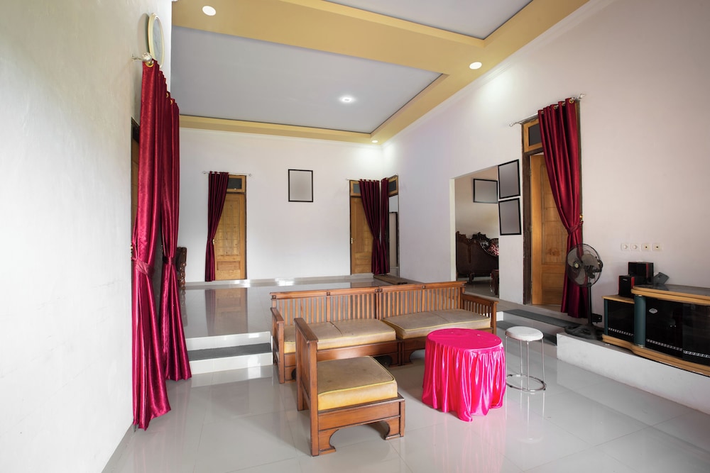 oyo 92587 homestay romauli kampung radja