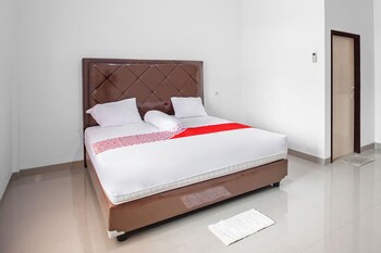 oyo 92587 homestay romauli kampung radja
