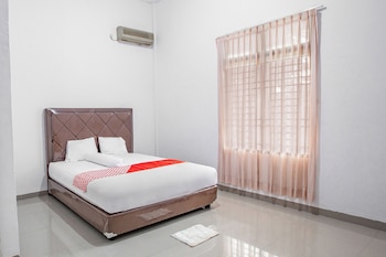 oyo 92587 homestay romauli kampung radja