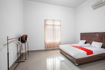 oyo 92587 homestay romauli kampung radja