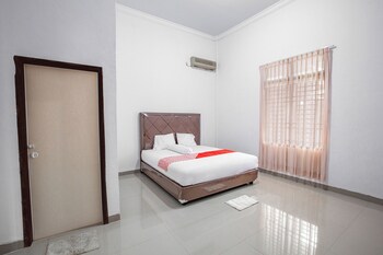 oyo 92587 homestay romauli kampung radja