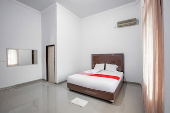oyo 92587 homestay romauli kampung radja