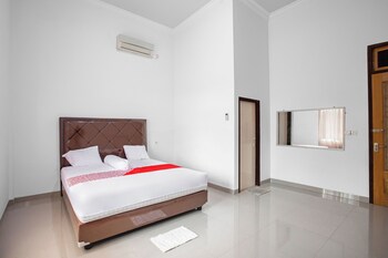 oyo 92587 homestay romauli kampung radja