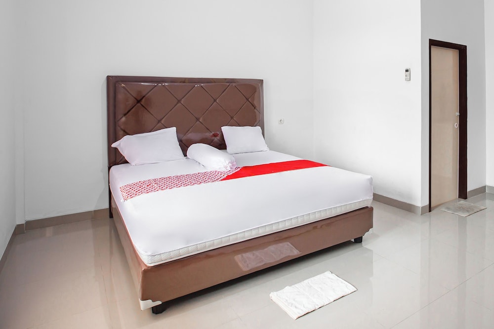 oyo 92587 homestay romauli kampung radja