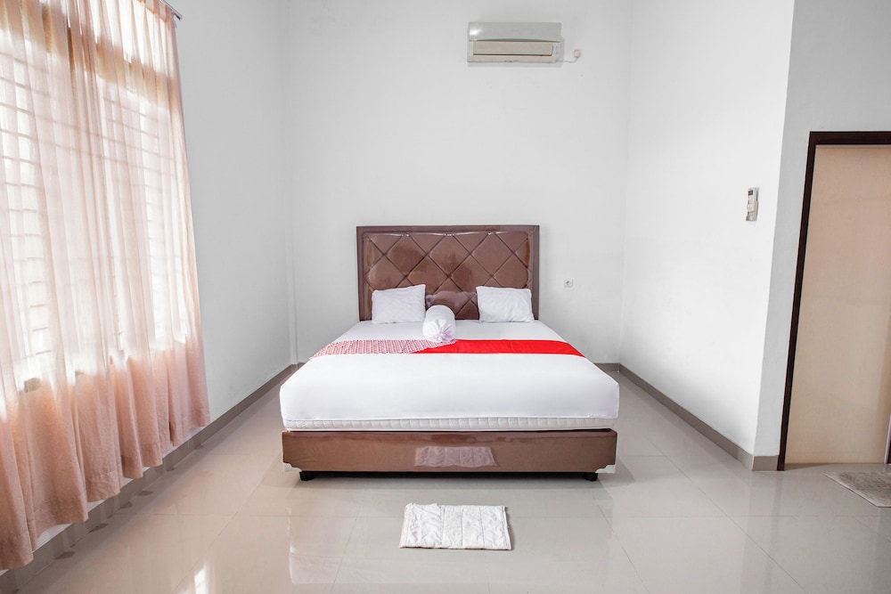 oyo 92587 homestay romauli kampung radja