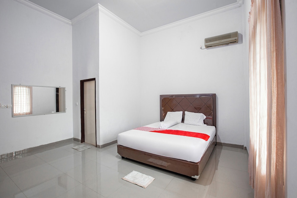 oyo 92587 homestay romauli kampung radja