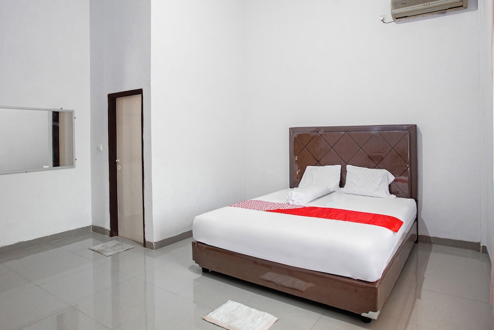 oyo 92587 homestay romauli kampung radja