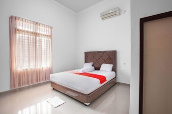 oyo 92587 homestay romauli kampung radja