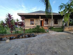 oyo 92587 homestay romauli kampung radja