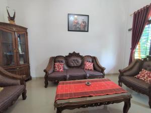 oyo 92587 homestay romauli kampung radja