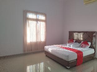 oyo 92587 homestay romauli kampung radja