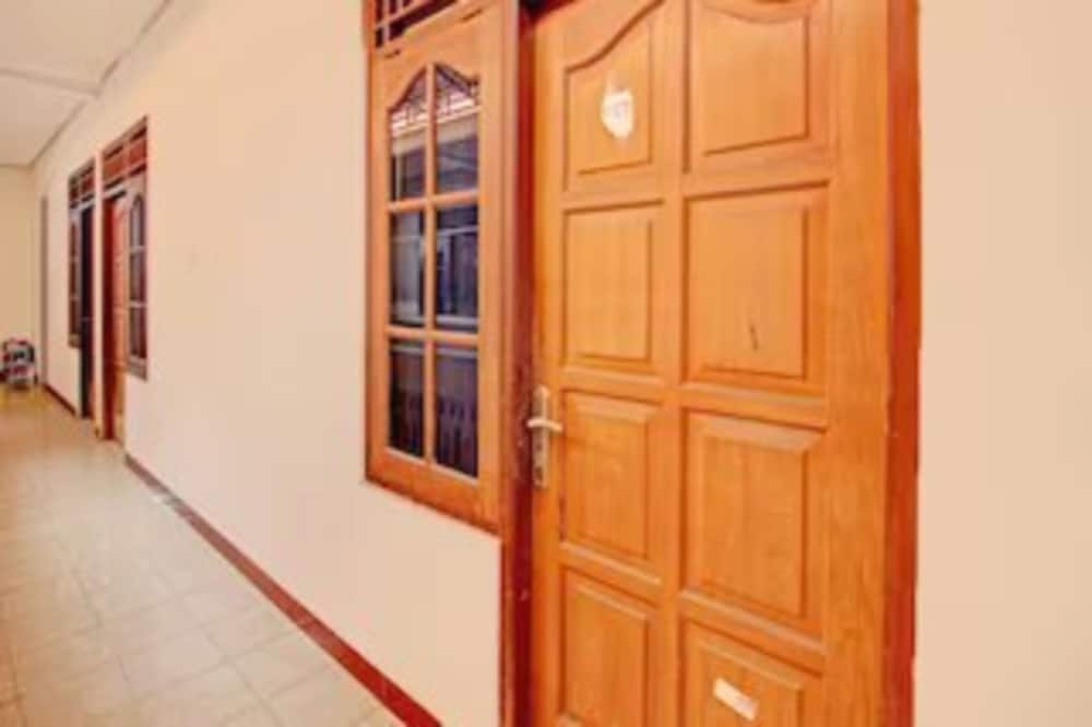 spot on 92434 puri kasih guest house syariah