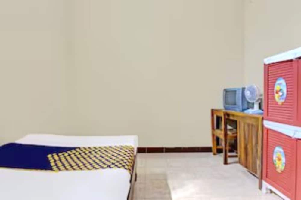 spot on 92434 puri kasih guest house syariah