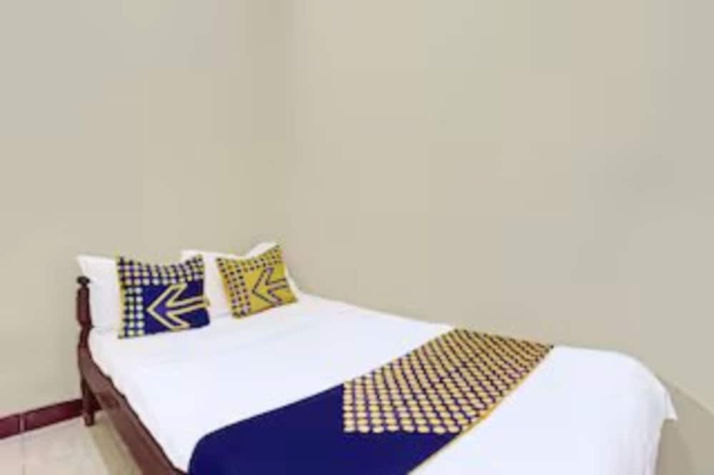 spot on 92434 puri kasih guest house syariah