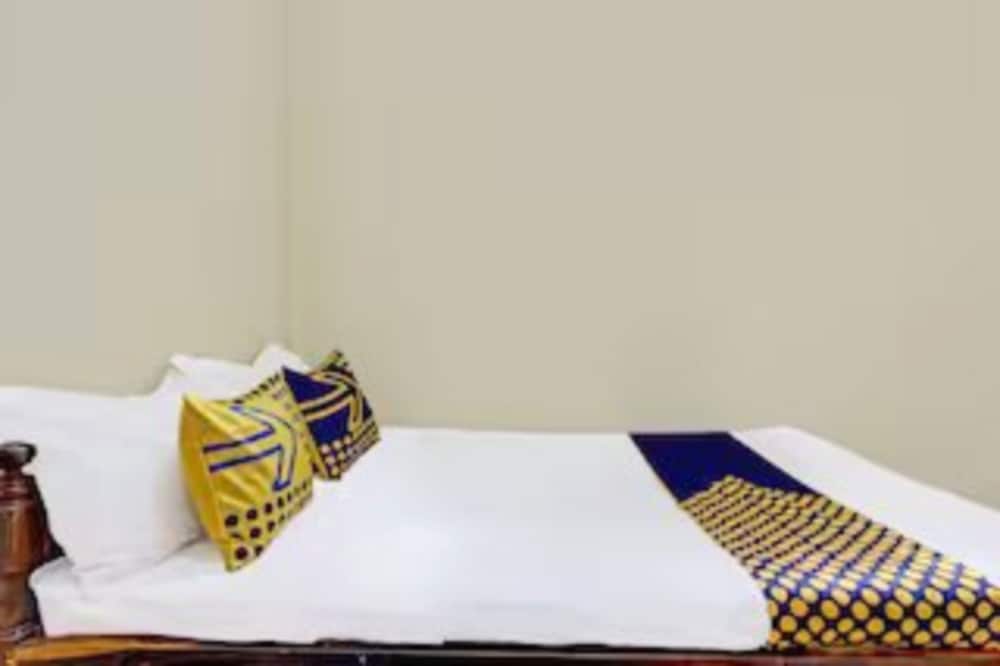 spot on 92434 puri kasih guest house syariah