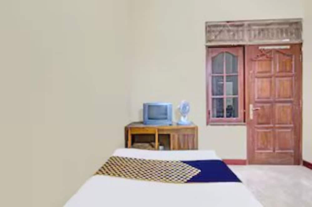 spot on 92434 puri kasih guest house syariah