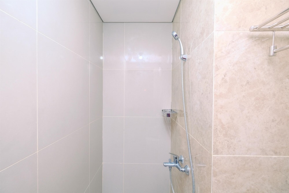 modern look and homey 2br transpark cibubur apartment near mall