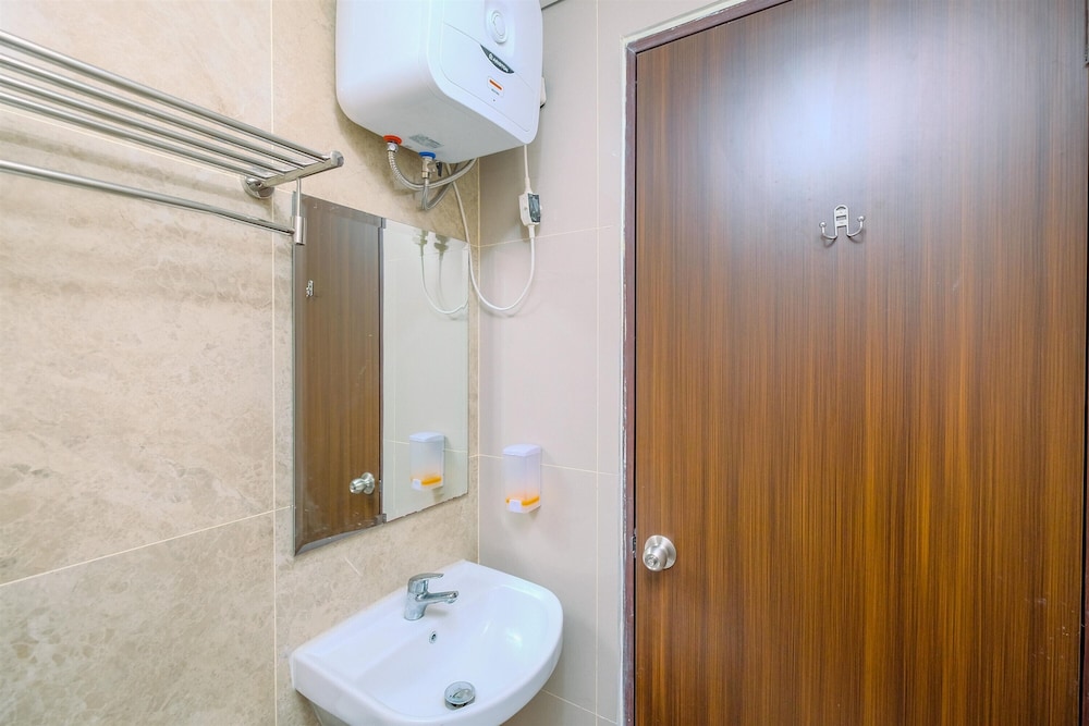 modern look and homey 2br transpark cibubur apartment near mall