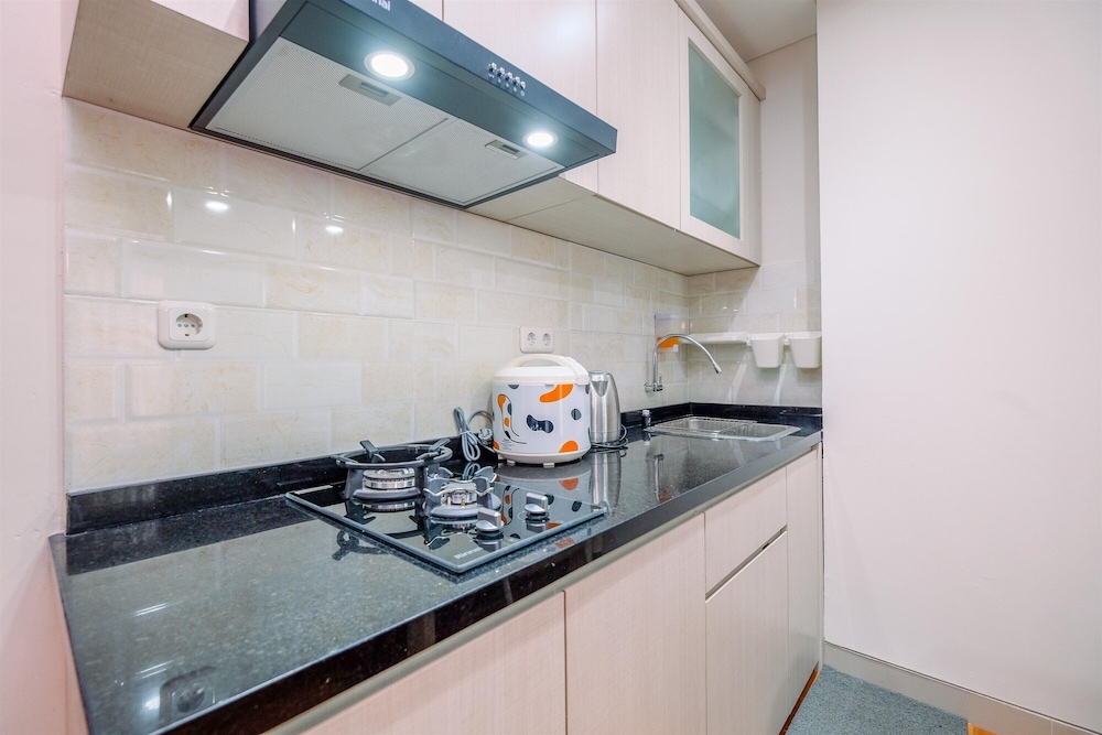 modern look and homey 2br transpark cibubur apartment near mall