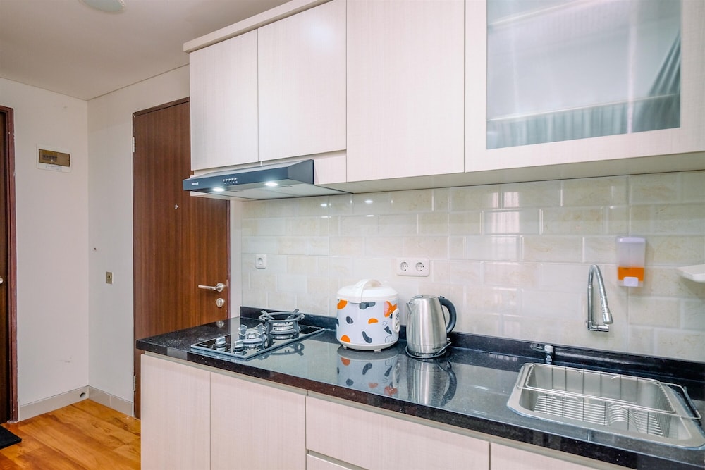 modern look and homey 2br transpark cibubur apartment near mall