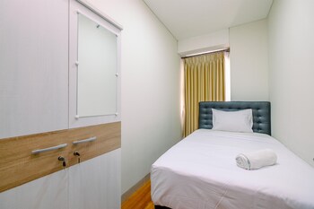 modern look and homey 2br transpark cibubur apartment near mall