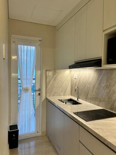 apartment podomoro medan by ols studio