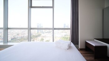 minimalist with beautiful view 2br at grand sungkono lagoon apartment