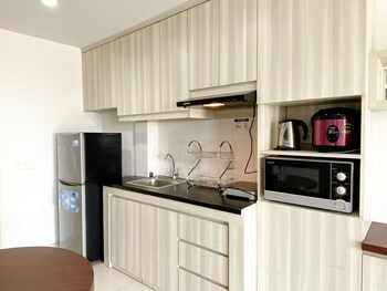 spacious and comfy studio room azalea suites apartment