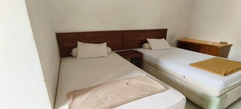 oyo 93123 wisma hamalau syariah