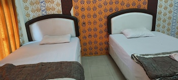 oyo 93123 wisma hamalau syariah