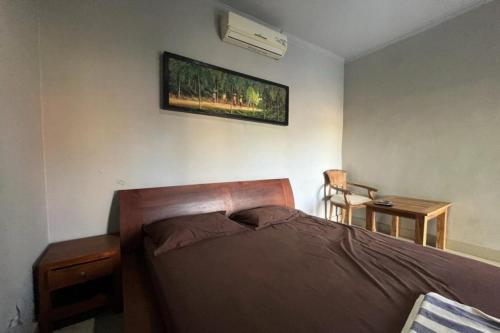 oyo 93206 penginapan budi syariah