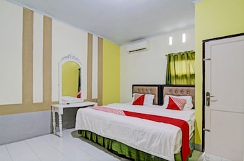 oyo 93206 penginapan budi syariah