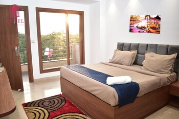 qotel hotel signature bnb ashok vihar
