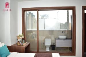 qotel hotel signature bnb ashok vihar